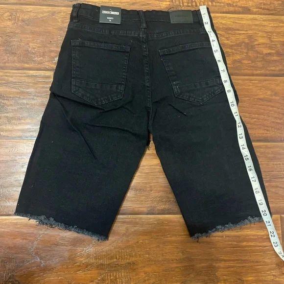 Black Jean Shorts with Heavy Distressing and Frayed Edges - Picture 3 of 4